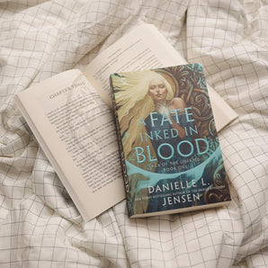 A Fate Inked in Blood: A Norse-inspired fantasy romance from the bestselling author of The Bridge Kingdom Paperback –